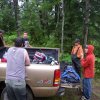 13-crew members gather around for a chilly break